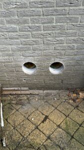 Gat geboord in de buitengevel in 's Hertogenbosch voor een monoblock airco